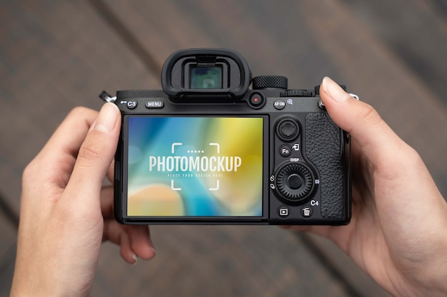 PSD photograph holding professional photo camera