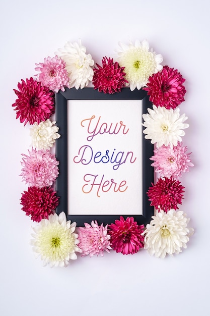 PSD picture frame mockup decorated with chrysanthemum flowers