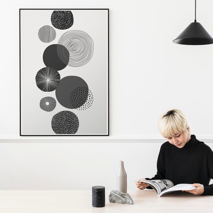 PSD picture frame mockup woman reading magazine psd