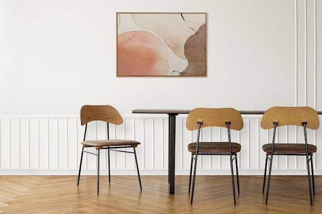 Cornice per foto mockup psd con tavolo in legno in una sala da pranzo con arredamento scandinavo