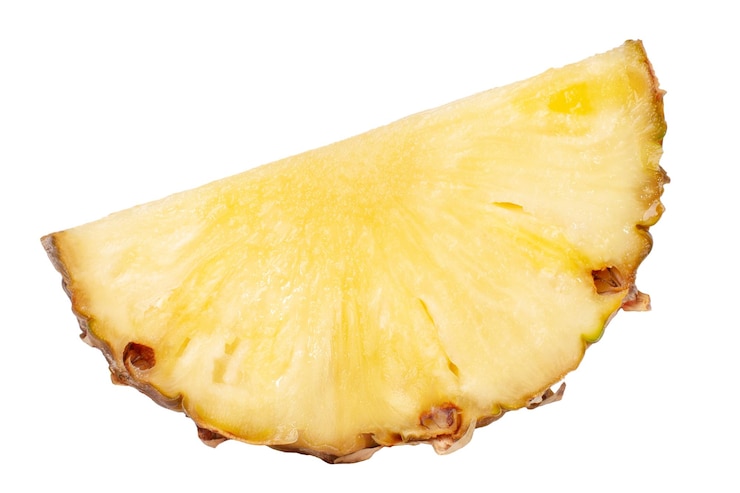 PSD a piece of fresh pineapple cut into half rings isolated