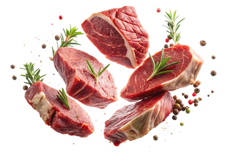 PSD pieces of fresh steak meat falling with herbs for ads and promotion posters on transparent bg