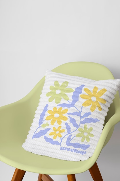 PSD pillow on chair mockup