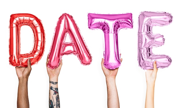 Pink alphabet balloons forming the word date