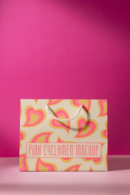 Pink cyclamen gift bag mockup