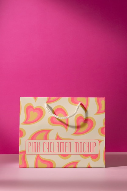 PSD pink cyclamen gift bag mockup