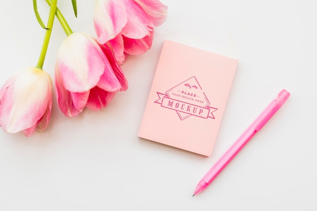 pink flowers concept with pencil