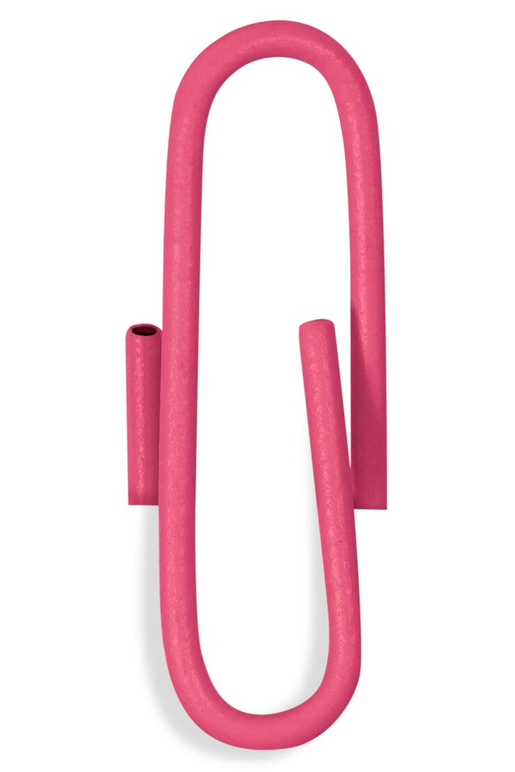 PSD pink paperclip on a blank background