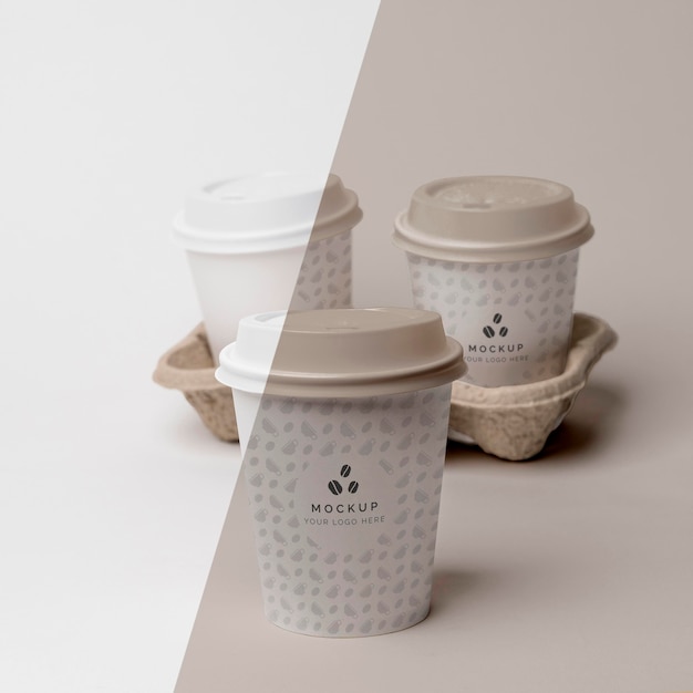 PSD plastic cup with coffee mock up in support