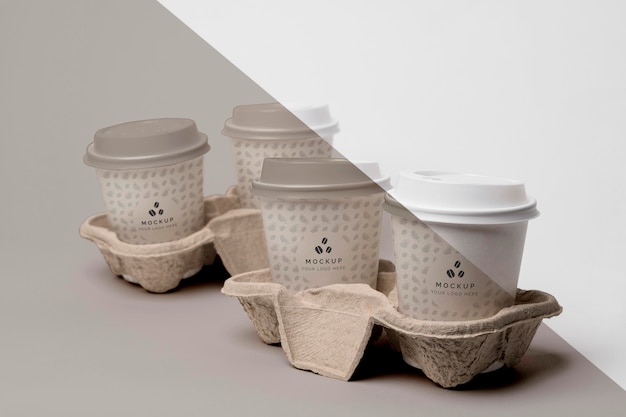 PSD plastic cup with coffee mock up in support