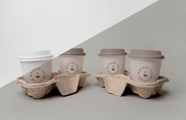 PSD plastic cup with coffee mock up in support