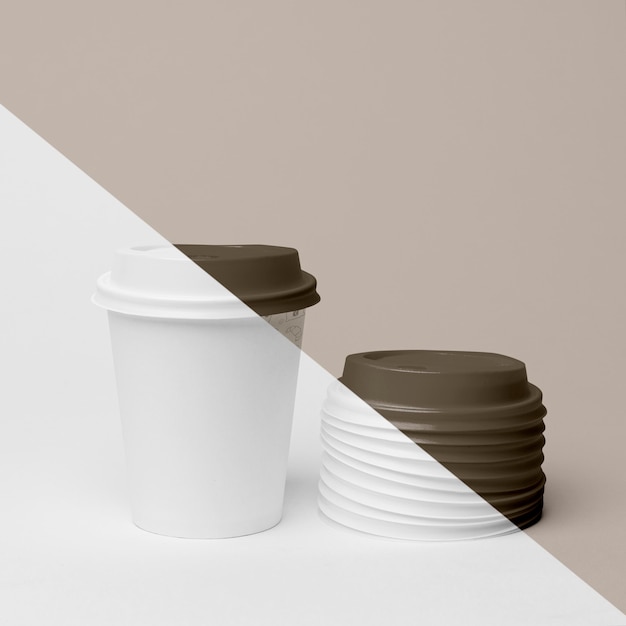 Plastic cup with coffee mock up