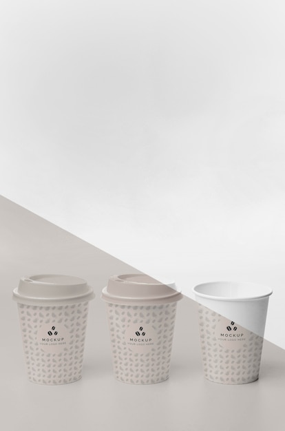 Plastic cups with coffee mock up on table