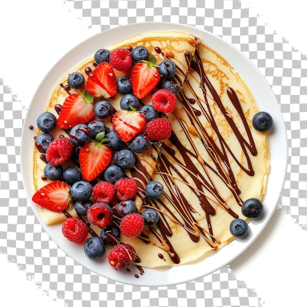 a plate of food with berries and a crepe on it