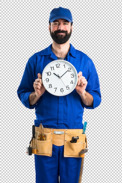 Idraulico che tiene l'orologio