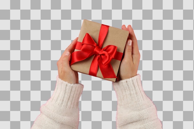 색 바탕에 고립된 손에 있는 PNG 선물 상자