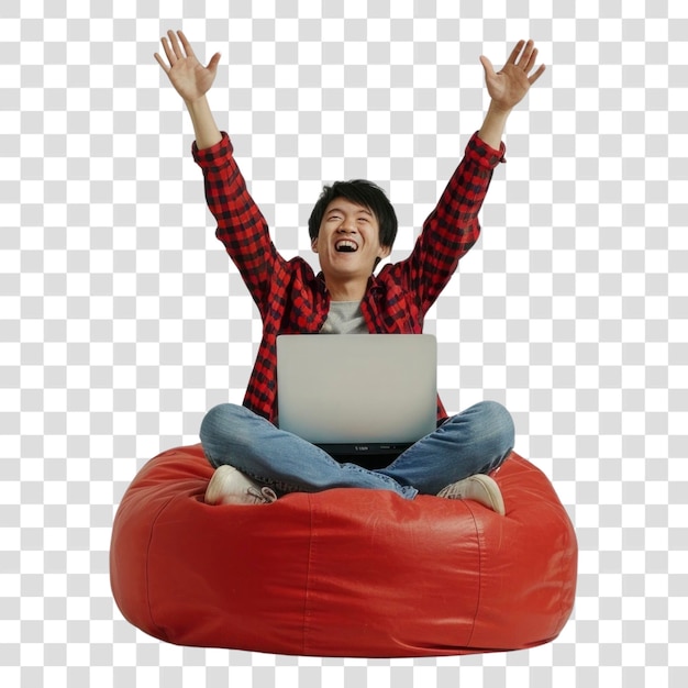 png man sitting on bean bag laptop person male