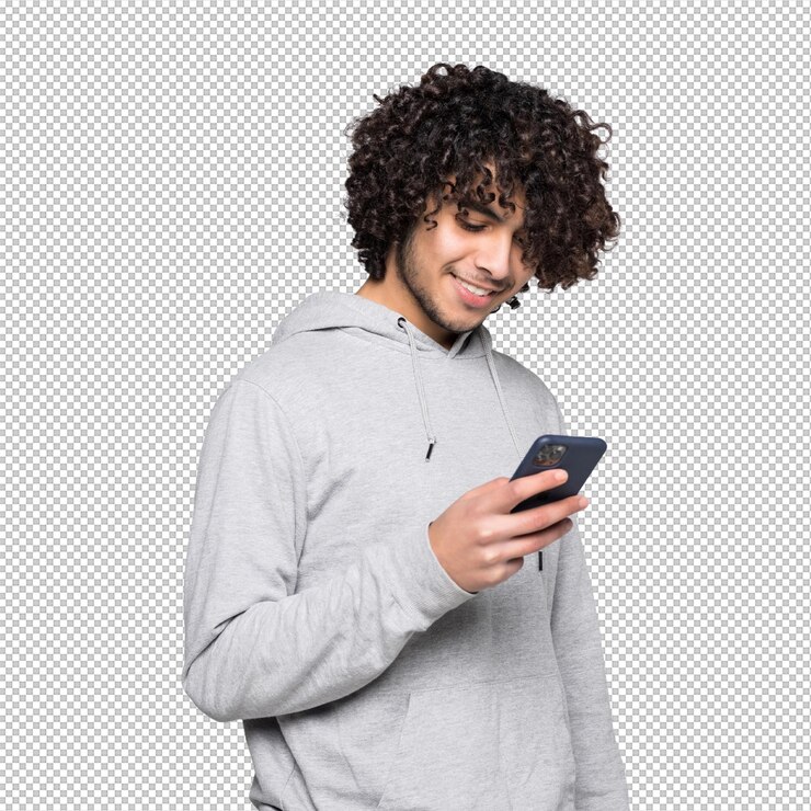 PSD portrait of handsome curly man holding phone isolated on white wall