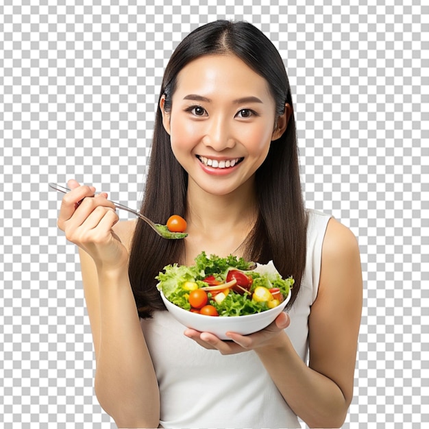Ritratto di una donna asiatica sana che mangia cibo vegano