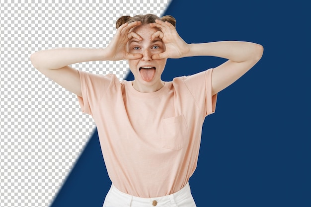 Portrait of joyful and playful funny caucasian woman with cute buns hairstyle sticking out