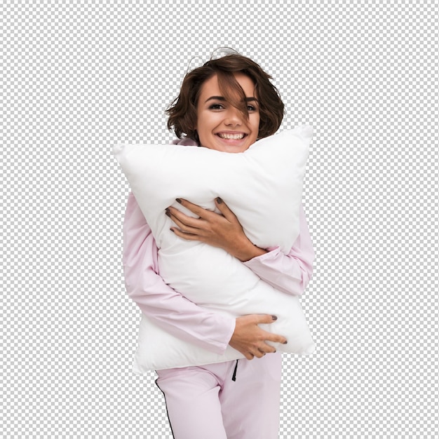 Portrait of a smiling woman in pajamas holding a pillow