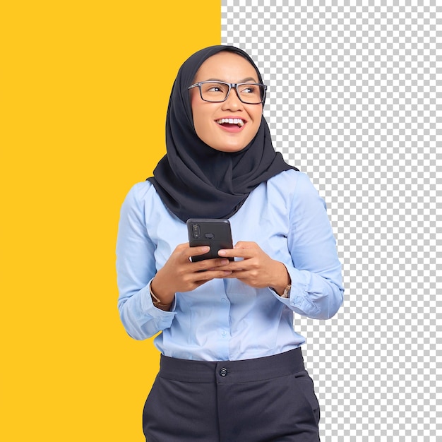 PSD portrait of smiling young asian woman using mobile phone and looking away