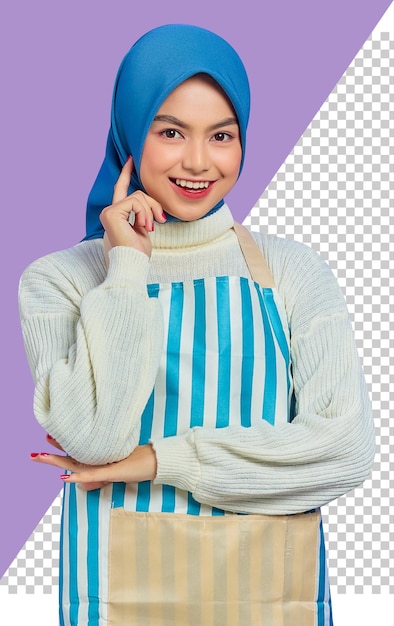 Portrait of smiling young housewife woman in hijab and striped apron put fingers on cheek isolated on purple background people housewife muslim lifestyle concept