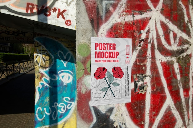 PSD poster mockup sul muro