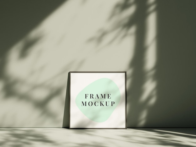 Poster photo frame mockup leanings against the pastel wall on the floor with shadow