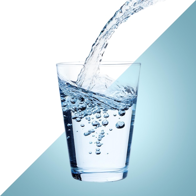 Pouring Fresh Water into a Transparent Glass