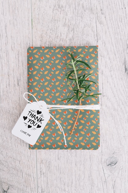 Present box mockup with leaves