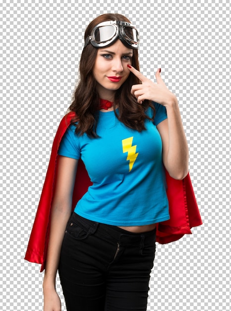 Pretty superhero girl showing something