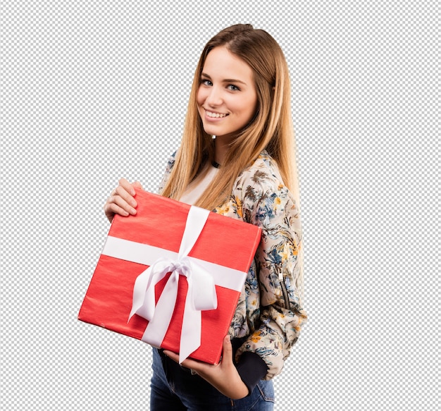 Pretty young woman holding a gift