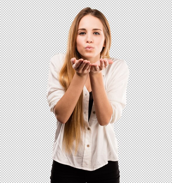 Pretty young woman sending kisses