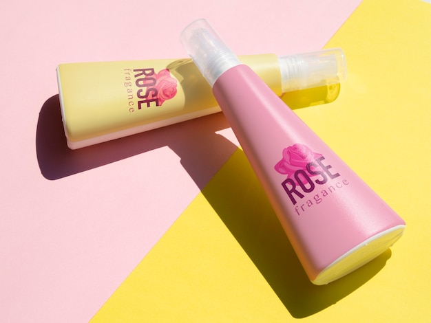 Product design with pink bottles mock-up on colorful background