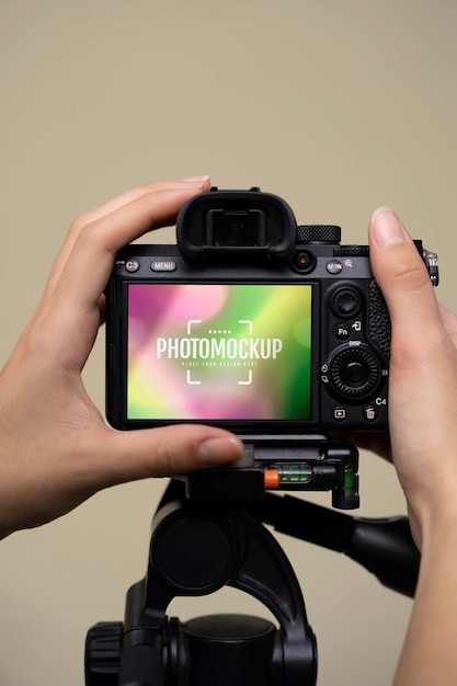 PSD professional photograph holding photo camera