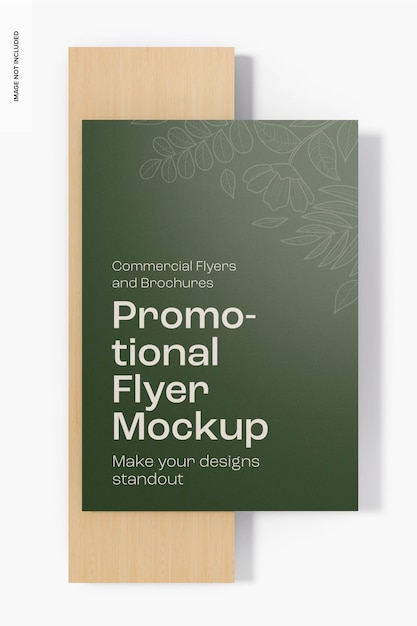 promotional flyer on wooden podium mockup top view