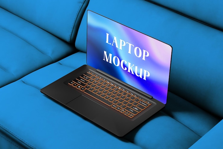 PSD psd gaming laptop on sofa mockup