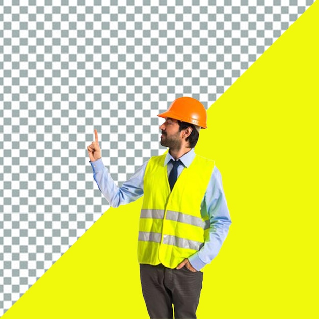 PSD:何かを指さしている黄色いハードハットをかぶった男性