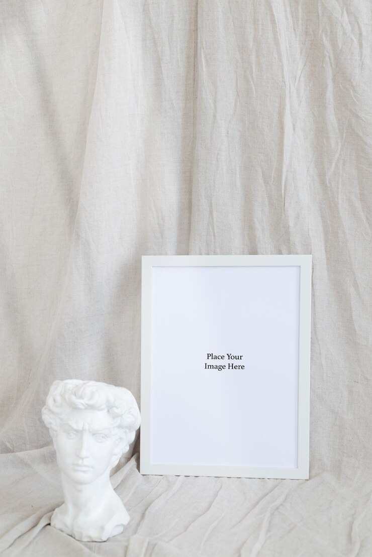 PSD psd photo frame mockup in the artist's studio