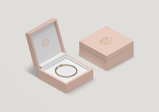 Pudełko na biżuterię o wysokim kącie różowym ze złotą bransoletką