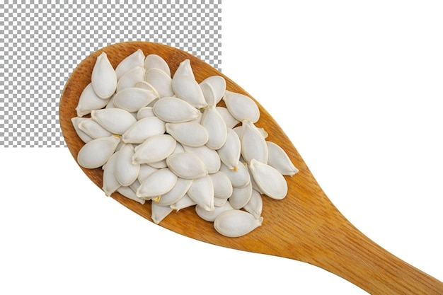 Pumpkin seeds lie in a wooden spoon isolated on a transparent background