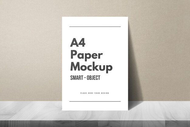 PSD realistic a4 paper mockup with leaning effect on wall texture