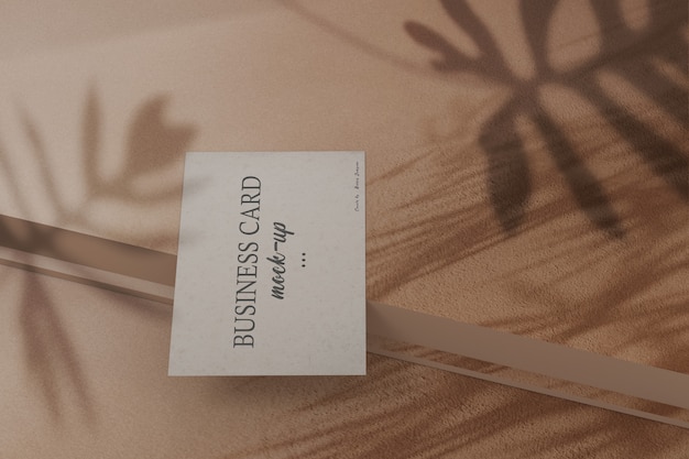 Realistic business card mockup with shadow overlay  