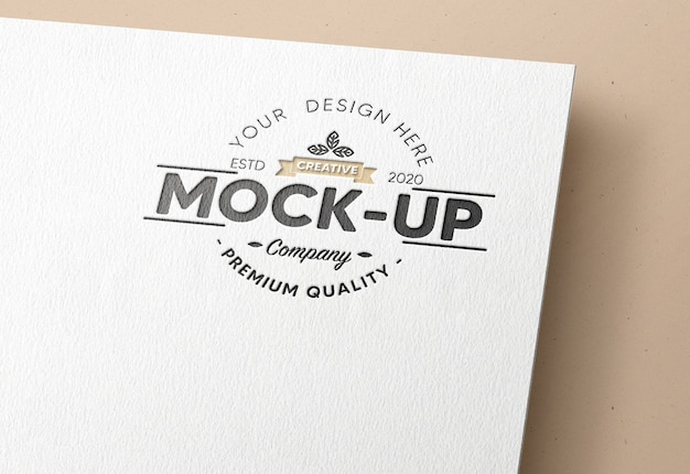 Realistic debossed logo mockup in white paper