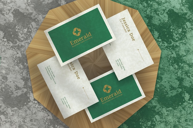 PSD realistic elegant business cards, top view on podium