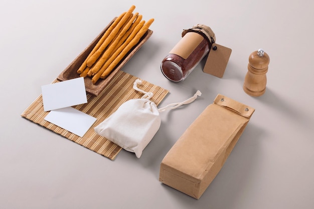 realistic food packaging mockup with white paper bag and rustic style