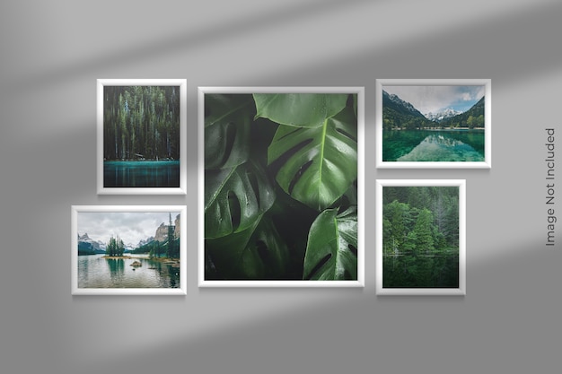 Realistic frames mockup hanging on wall with shadow overlay