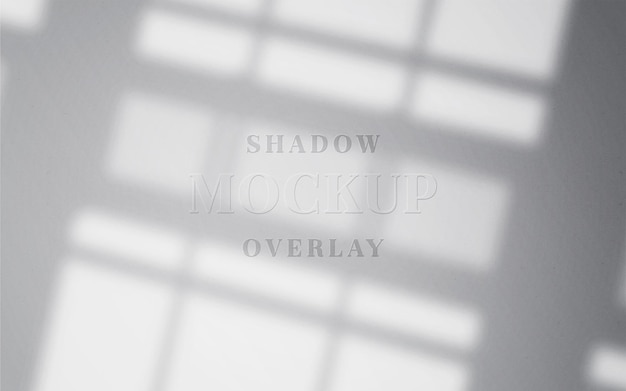 Realistic and minimalist shadow overlay effect on wall logo background mockup