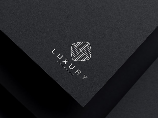 Premium PSD | Realistic silver embossed luxury logo mockup